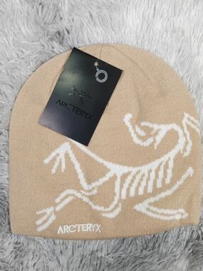 Arc'teryx Tan And White Bird Head Toque Skullcap Beanie